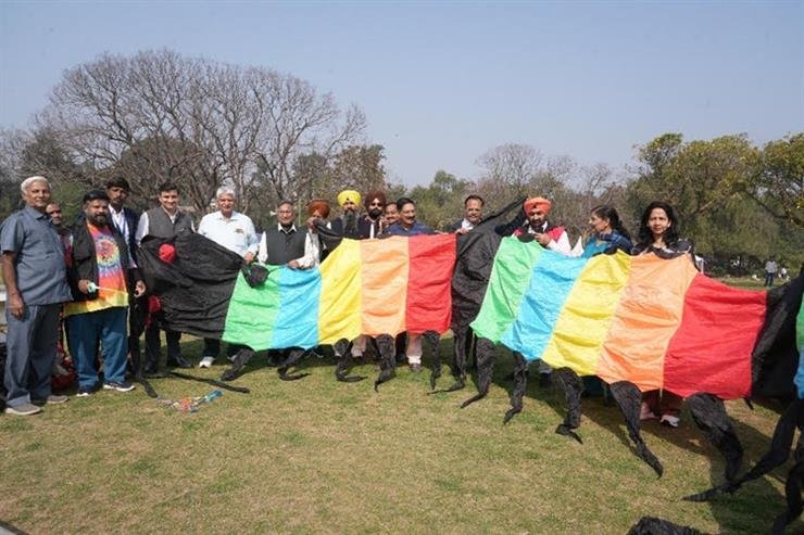 Children reminisce about their childhood by flying kites at the Rose Festival